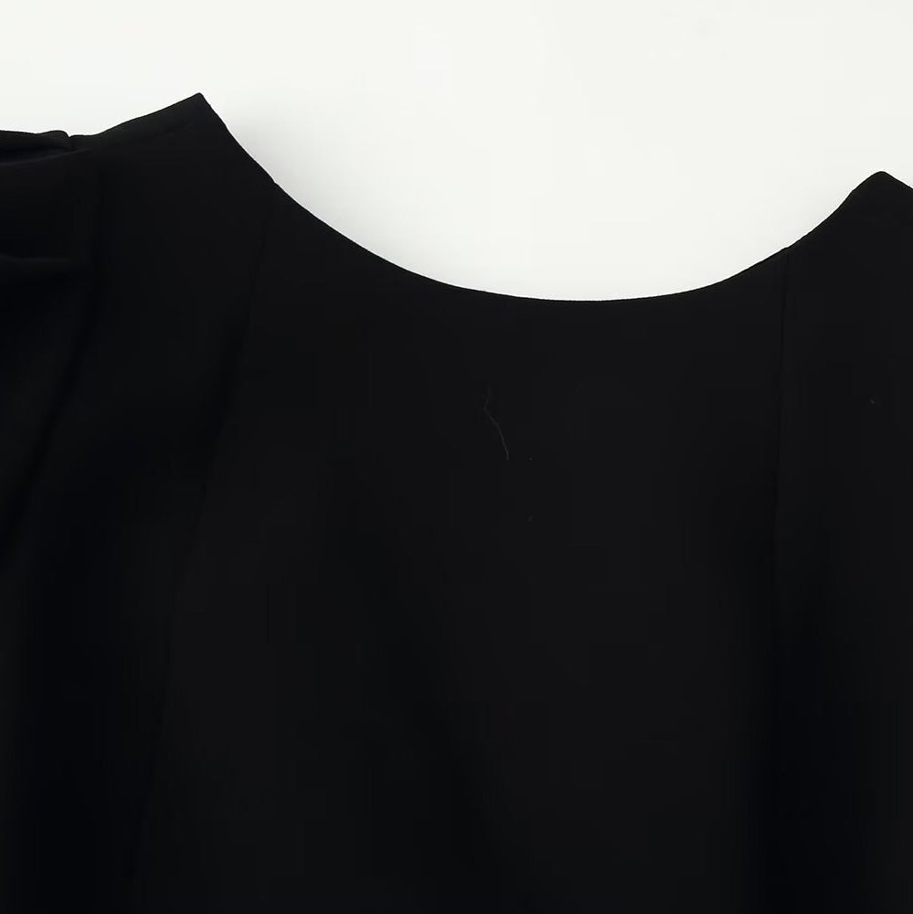 Blusa Elegante de Manga Abullonada con Detalle de Lazo