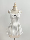 Vestido corto de lunares con volantes y lazo