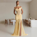 Off-shoulder asymmetrical evening dress with a slimming fitted mermaid silhouette