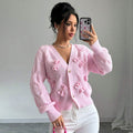 Solid color long sleeved bow sweater for women