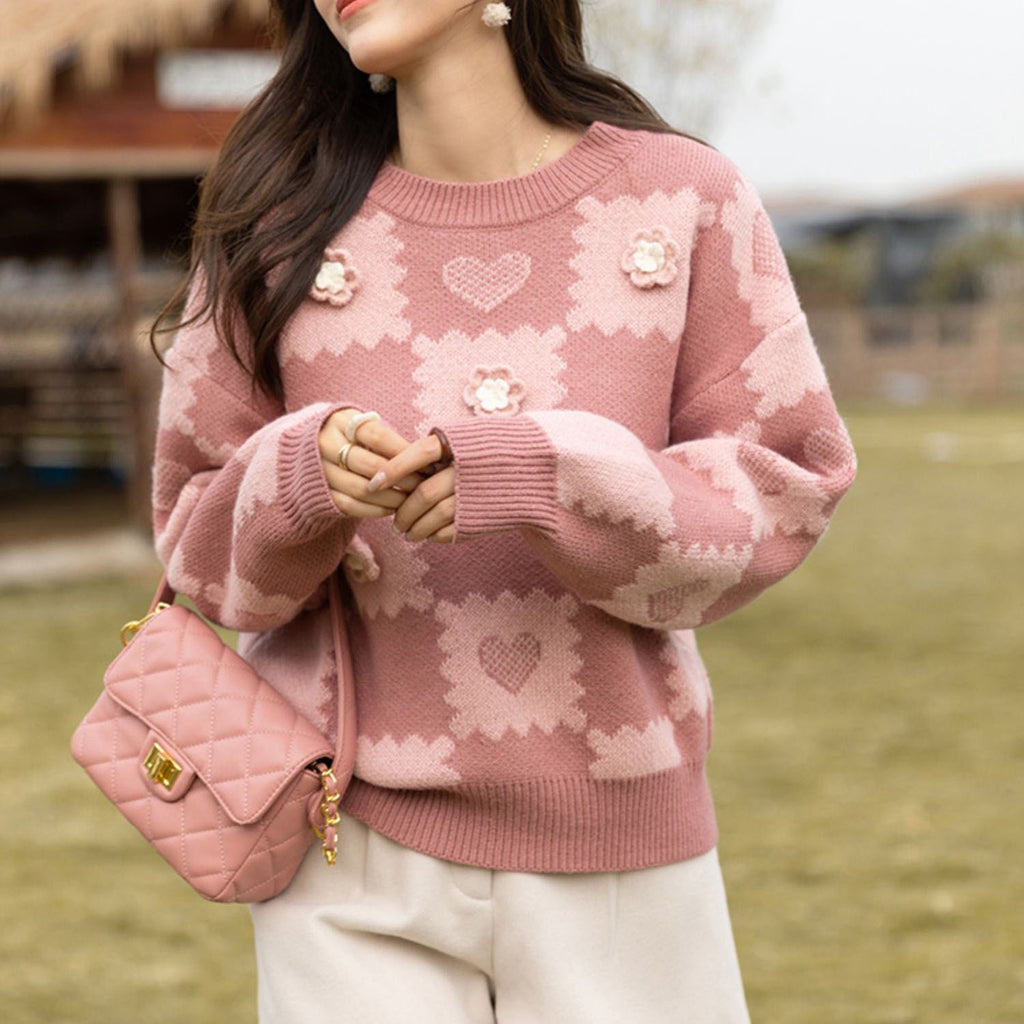 Loose fitting design with a pink knit sweater