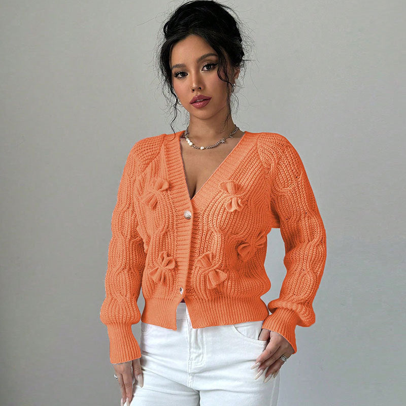 Solid color long sleeved bow sweater for women