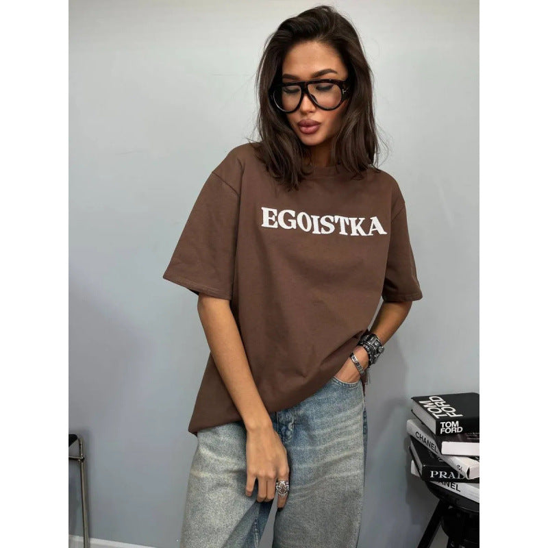 Camiseta ancha de manga corta con cuello redondo y estampado de letras