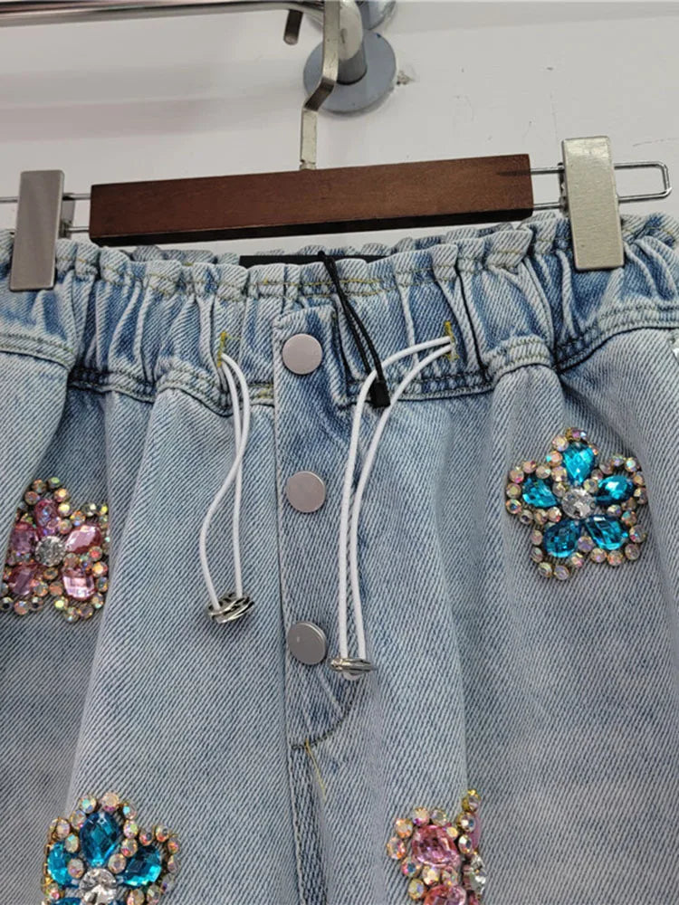 Denim shorts with Flower set with diamonds details elastic high waist loose fit and slimming effect