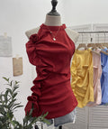 Sleeveless ruffled three-dimensional flower top