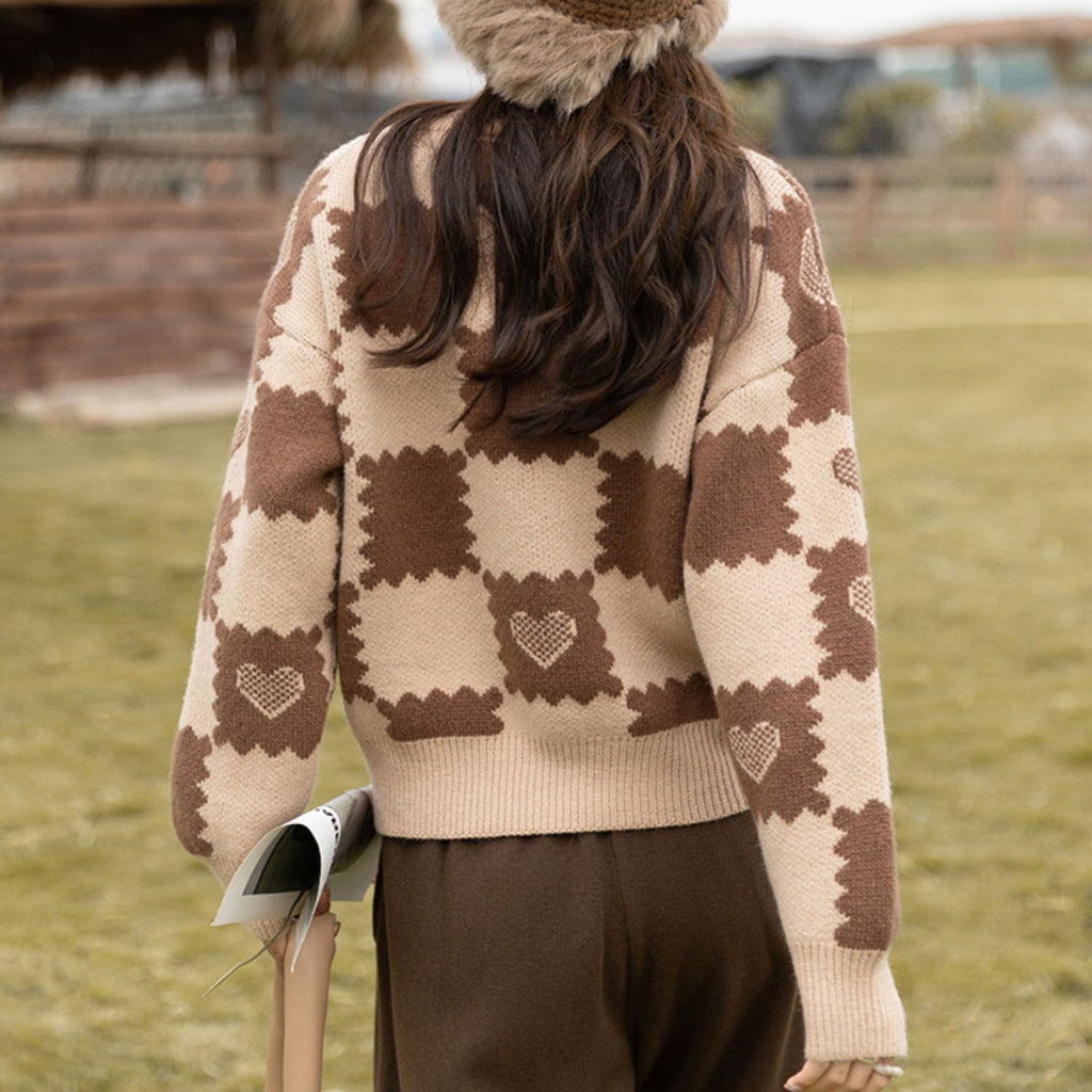 Loose fitting design with a pink knit sweater