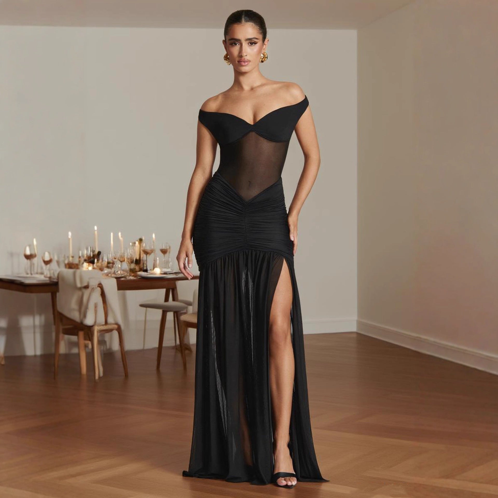 Vestido de noche asimétrico con hombros descubiertos y silueta sirena entallada