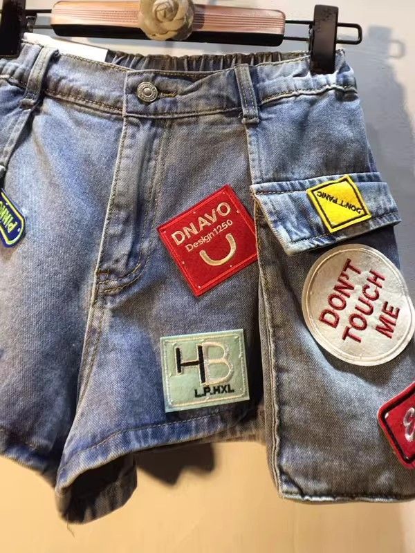Shorts vaqueros cargo de cintura alta para mujer con parche bordado